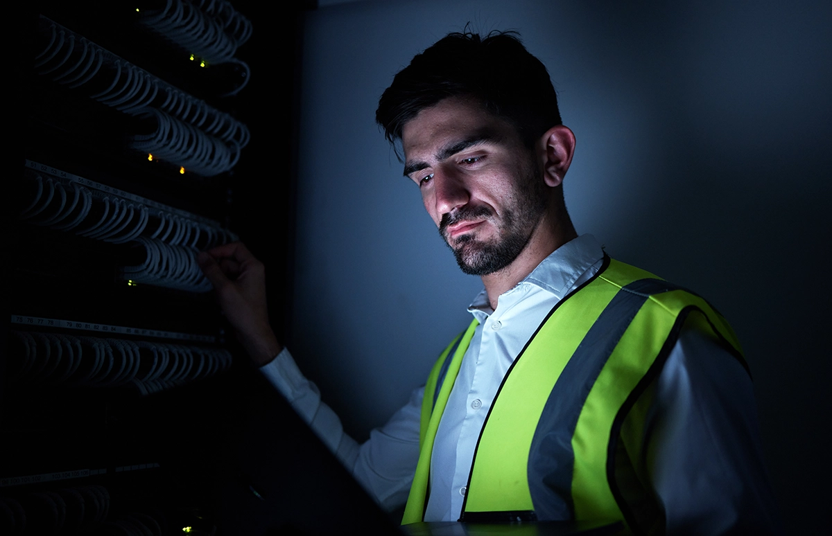 Engineer carrying out data centre commissioning